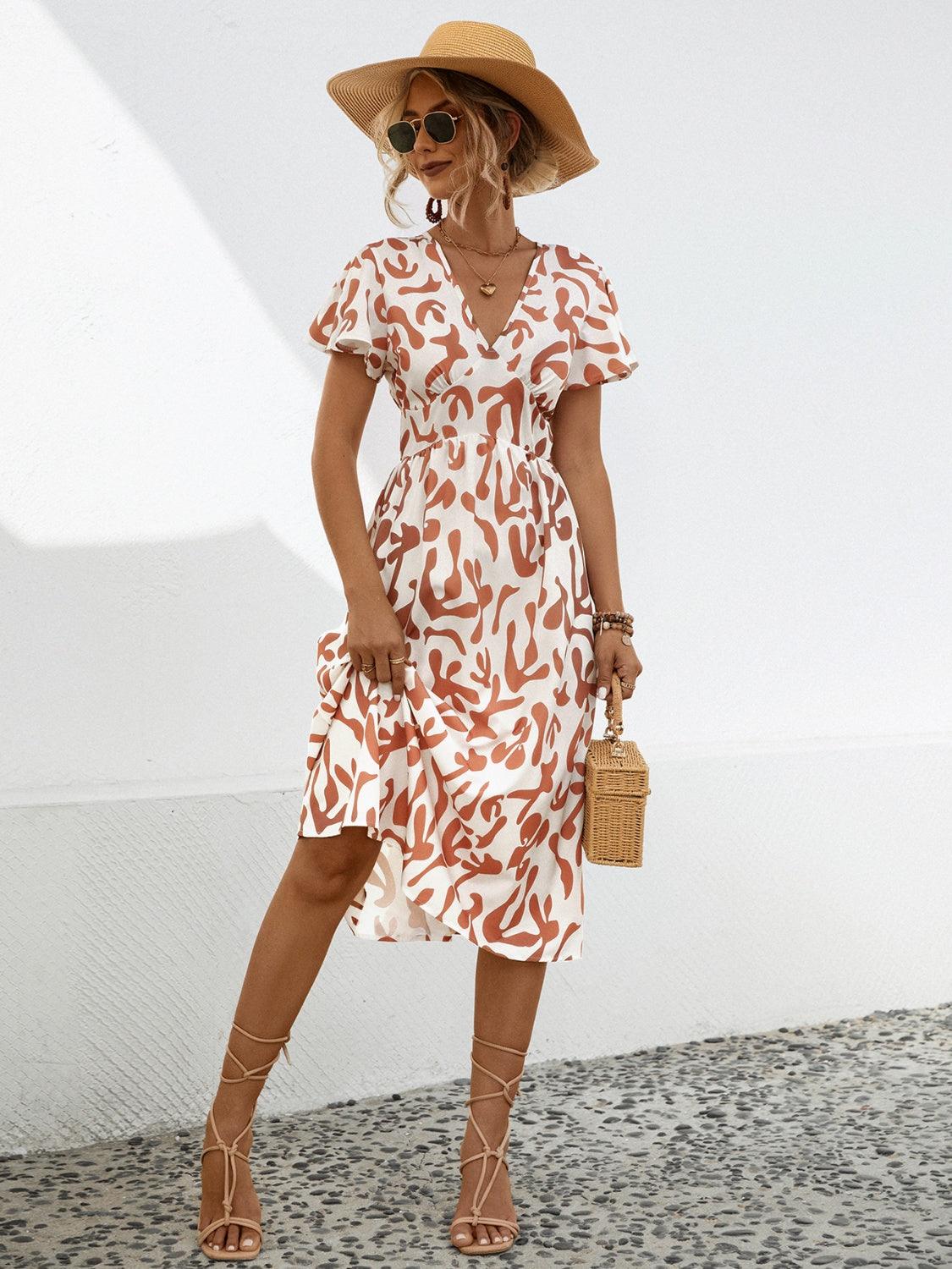 Printed V-Neck Short Sleeve Dress Carauana Store