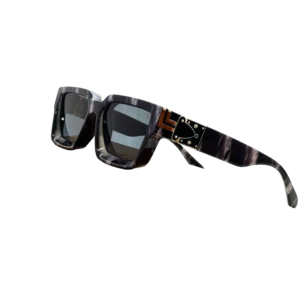 Carauana Millionaire GO with decorative arm on a cardboard box