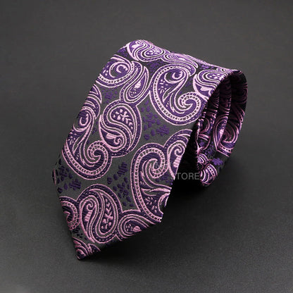 Purple paisley patterned tie on a dark gray background